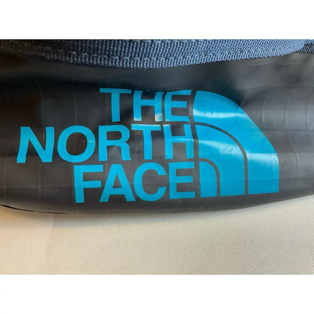 The North Face Base Camp Voyager 32L- Black with teal accent